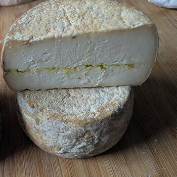 Tommette de chèvre aromatisée au citron et poivre vert