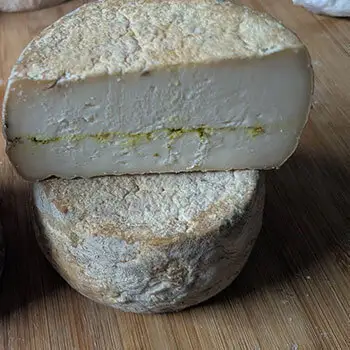 Tommette de chèvre aromatisée au citron et poivre vert
